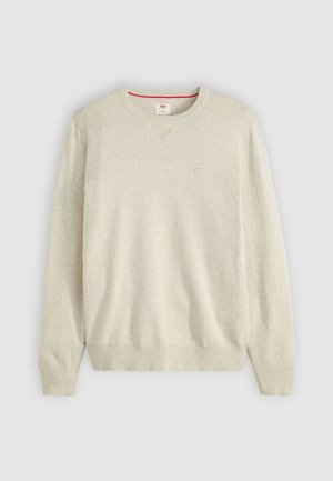 Beeži pika varrukatega crewneck särk ribidega mansettide ja alumise osa, väike tikandiga logo vasakul rinnal ning punane detail krae sisepinnal.