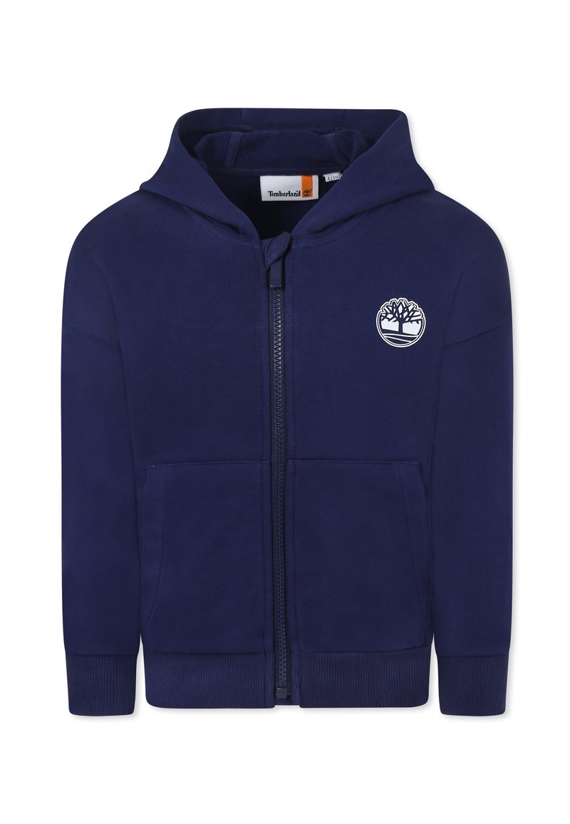 Haut à capuche zippé bleu marine en tissu doux, avec un logo sur le devant, deux poches latérales et des poignets et un ourlet côtelés.