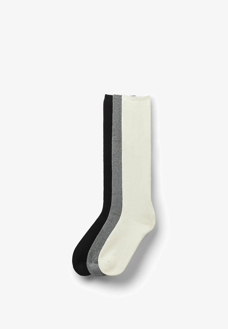 Sada tří ponožek v černé, šedé a krémové barvě. Vyrobené z hladké látky, každá ponožka má žebrovaný lem a jednobarevný design.