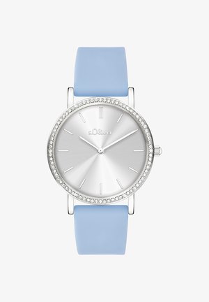 Silberfarbene Uhr mit glattem, metallischem Zifferblatt, hellblauem Silikonarmband und mit Edelsteinen besetzter Lünette. Verfügt über minimalistische Stundenmarkierungen.