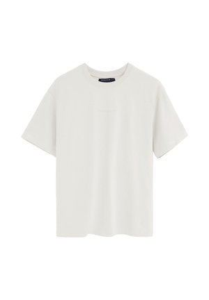 Weißes T-Shirt mit kurzen Ärmeln und Rundhalsausschnitt, mit dezentem "Polo Club"-Stick auf der Brust und einem schwarzen Etikett innen im Kragen.