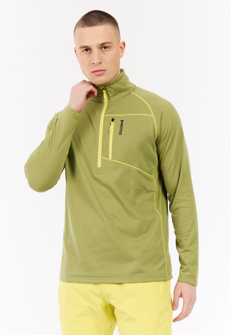 Zielona, długorękawowa bluza z półzamkiem, z kontrastującym żółtym przeszyciem i zamykaną na zamek kieszenią na piersi. Teksturowany materiał.