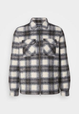 Plaid jacket in gray and off-white, made from soft fabric. Features two chest pockets and a zip front with a collared neckline.