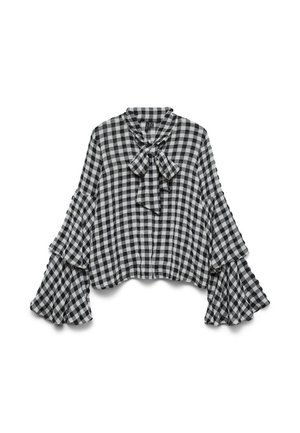 Blusa a quadretti bianca e nera con maniche lunghe arricciate e colletto con fiocco frontale, distesa su uno sfondo bianco.