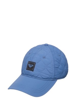 Blue quilted baseball cap with curved brim and small black square patch featuring a stylized heart logo on the front.