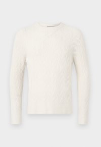 Cream cable-knit sweater with long sleeves, round neckline, and ribbed hem. Features a textured pattern throughout the fabric.