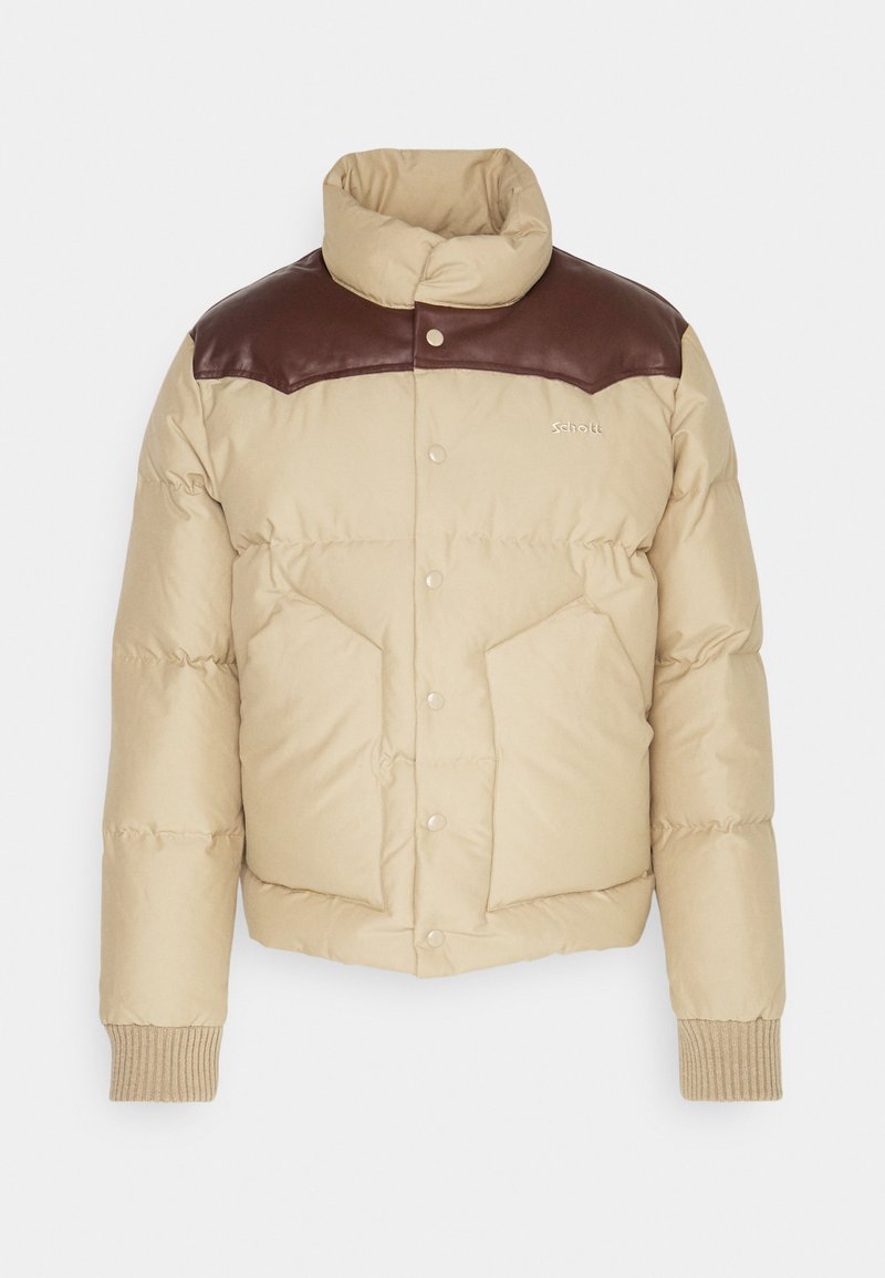Giubbotto imbottito beige con dettagli in pelle marrone sulle spalle, bottoni a pressione, due tasche frontali, polsini a coste e design del colletto alto.