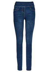 Jean en denim bleu avec une coupe slim, présentant une taille haute, deux poches avant et des coutures contrastées. Le tissu a une finition lisse et texturée.