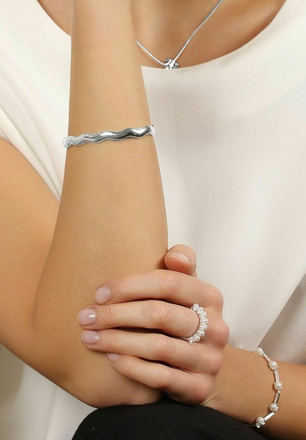 ROW OVAL BRACE - Armband