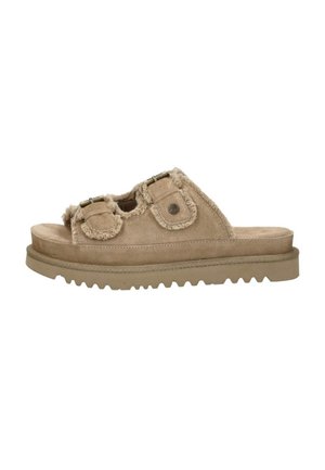 Sandale mule en daim beige avec deux brides boucle réglables et une bordure duveteuse sur une semelle épaisse et rainurée.