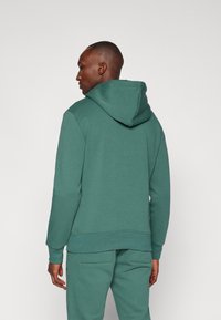 Björn Borg ESSENTIAL HOODIE - Jersey con capucha - bistro green