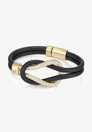 Pulsera de cuero negro con herrajes dorados, que presenta un diseño entrelazado y una fila de piedras de imitación transparentes a lo largo de la curva.