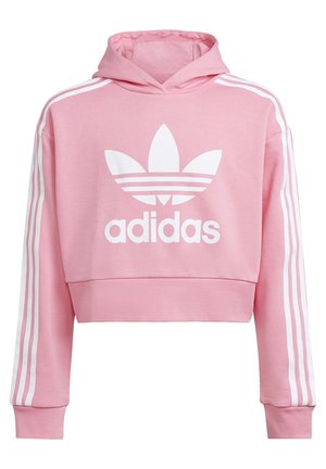 Sudadera rosa recortada con logo de trébol de Adidas en blanco en el frente y tres rayas blancas a lo largo de las mangas largas.