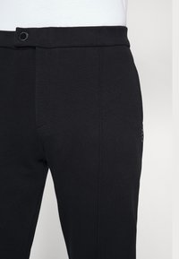 Ron Dorff - PIQUÉ TENNIS - Pantalon classique - black - 4