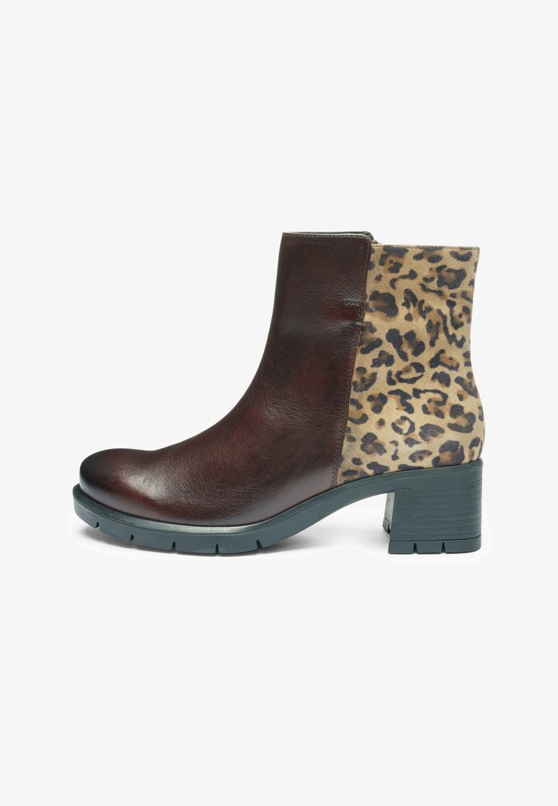Ankle boot with dark brown leather front and leopard print suede back, featuring a chunky black heel and rubber sole.