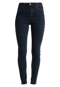 Dámské džíny s vysokým pasem v tmavě modrém denimovém materiálu. Obsahují klasický pětikapsový design, jemné švy a zapínání na knoflík v pase.