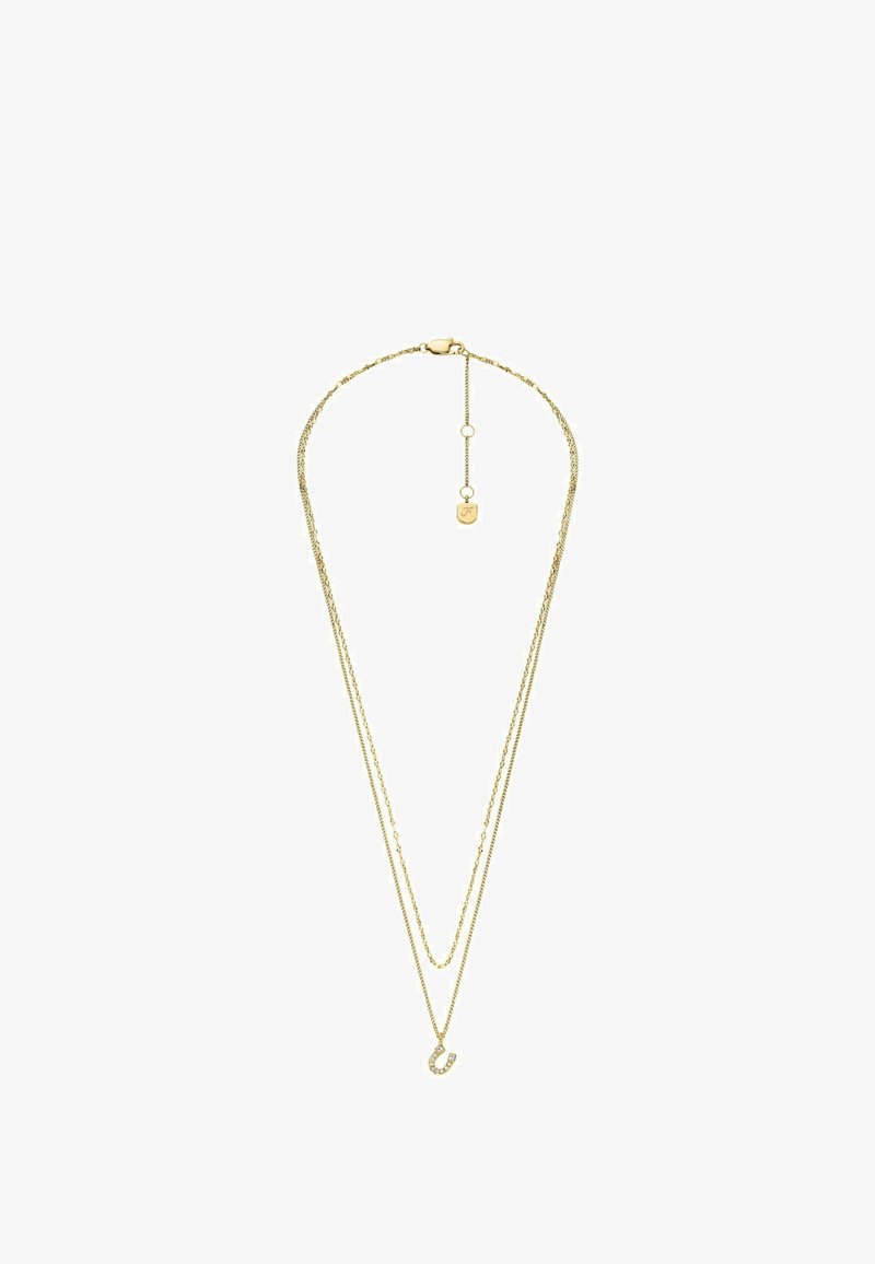 Collier en ton or avec deux chaînes superposées. Une chaîne est lisse, tandis que l'autre présente un accent décoratif avec des lettres et des strass.