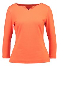 Długosleeve top w jaskrawym pomarańczowym kolorze, wykonany z gładkiego materiału. Posiada delikatny dekolt w serek i dopasowany krój.