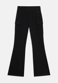 Pantalons évasés noirs en tissu doux, dotés de deux poches cargo sur les côtés et d'une taille élastique avec un logo sur la hanche.