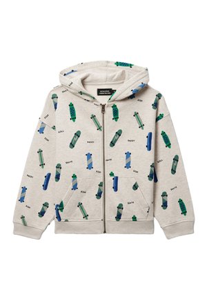 Sweat à capuche beige zippé avec poches avant, décoré de motifs de skateboard bleus et verts ainsi que des mots comme "ride", "skate" et "enjoy".