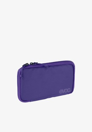 Purple zippered pouch made of textured fabric, featuring a smooth finish, rounded edges, and a logo on the side.