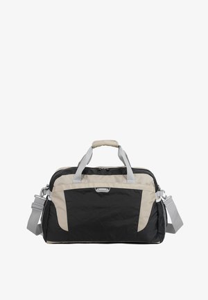 Grand sac de sport noir et beige avec deux poignées grises, bandoulière détachable et poche avant zippée.