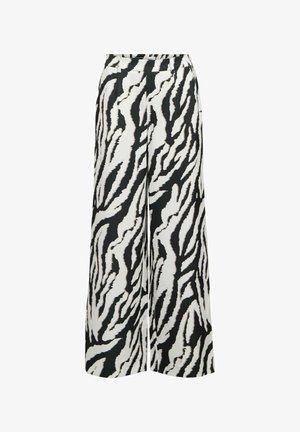 Hlače širokih nogavica s elastičnim pojasom, sa smjelim crno-bijelim uzorkom zebre na glatkoj tkanini.