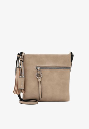 Beżowa torebka typu crossbody z ekoskóry z przednią kieszenią na zamek, czarnym wykończeniem, regulowanym paskiem i ozdobnym detalem w postaci frędzla.