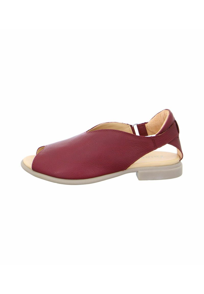 Maroone leather sandal with an open toe, low heel, and cutout design. Features a cushioned insole and a contrasting light sole.
