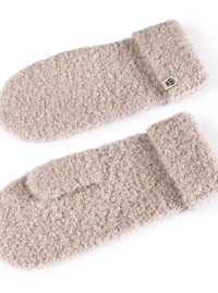 Beige wool mittens with a textured, fuzzy surface, featuring a folded cuff and a small tag on one side. Embossed design on the tag.