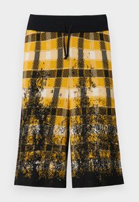 FADED UNISEX - Šorti - blurry black/yellow