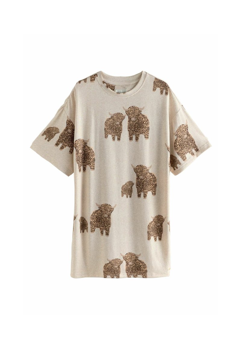 T-shirt beige à manches courtes en coton, arborant un motif animalier marron répété avec des textures en fourrure détaillées et des cornes.