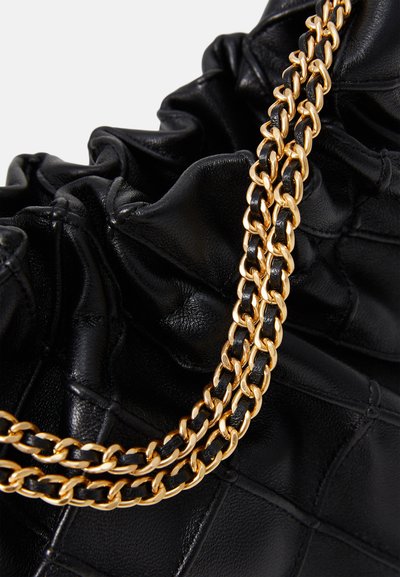Tory Burch FLEMING MINI HOBO - Håndtasker - black