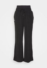 Puma MODEST ACTIVEWEAR WIDE LEG - Treniņtērpa apakšdaļas - black