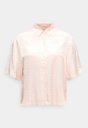 Light pink short-sleeve satin blouse with subtle diamond pattern, button front, and classic collar on plain background.