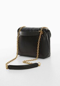 Black leather handbag with a soft texture, featuring a gold chain strap, rectangular shape, and a front flap for closure.