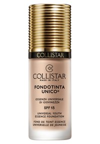 Bouteille de fond de teint de Collistar avec un capuchon à stries dorées. Le contenant est de couleur rose pâle et est étiqueté avec le texte "Fondotinta Unico" et SPF 15.