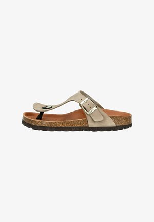 Beige ruskinds flip-flop sandal med en enkelt rem og sølvspænde, der har en korksål og sort gummisål med tekstureret mønster.