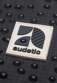 audetic DRIP - Marsupio - schwarz-rosa