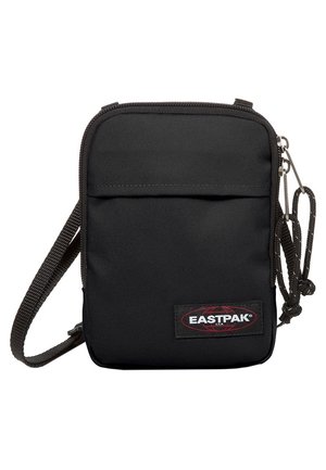 Sort Eastpak crossbody taske med lynlåslukket hovedrum, frontlomme, justerbar rem og logo-patch på frontens nederste højre side.