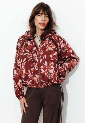 VENT À CAPUCHE IMPRIMÉ - Blouson - imprimé rouge