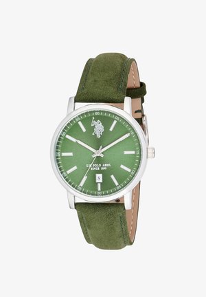 Orologio da polso con quadrante verde con indici argentati, finestra della data alle 6, logo U.S. Polo Assn. e cinturino in suede verde con fibbia argentata.