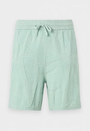 Pantaloncini in spugna verde chiaro con vita elasticizzata e coulisse, con sottili motivi a foglia testurizzati.