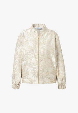 Veste bomber légère en crème avec un motif tropical en relief doré. Présente une fermeture éclair sur le devant, des poignets élastiques et un col montant.