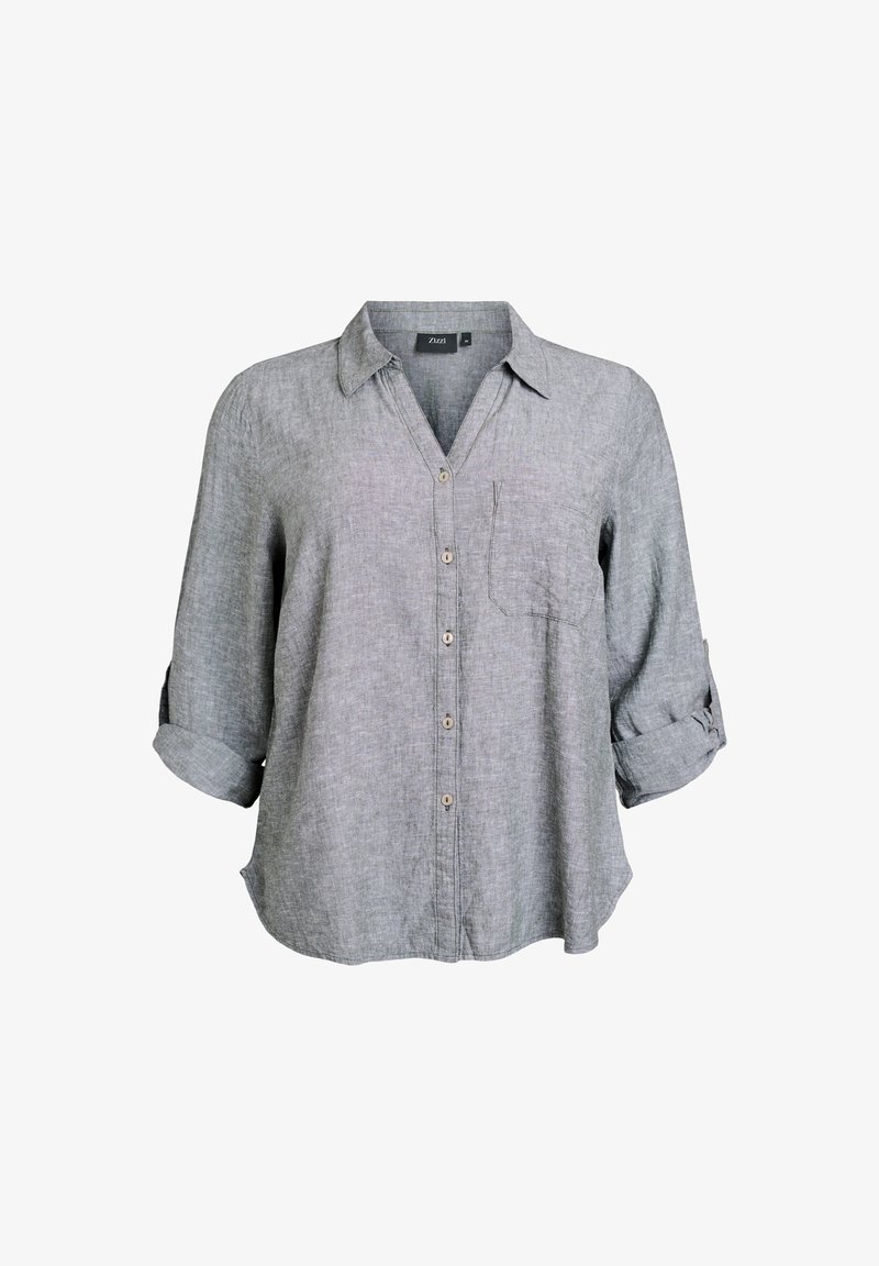 Gray, long-sleeve shirt with a collar, featuring a pocket and button closure. Made of soft fabric with a slightly textured appearance.