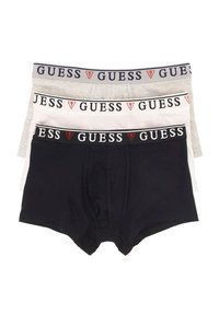 Three pairs of boxer briefs in black, gray, and white. Each features a stretchy waistband with "GUESS" logo in contrasting colors.