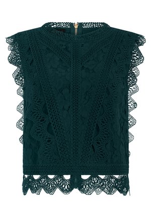 Haut sans manches en dentelle vert foncé avec motifs floraux, bords festonnés et fermeture éclair au dos.