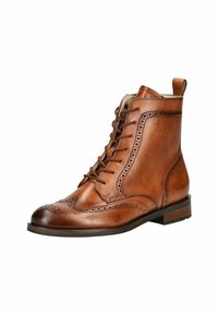 Stivali alla caviglia in pelle marrone con design con lacci, dettagli brogue sulla punta e sui lati, e un tacco rettangolare basso.
