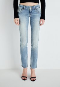 Light blue denim jeans with a slim cut, five-pocket design, and a button-up closure. Features a faded finish and cropped hem.