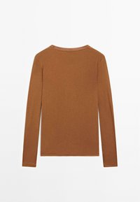 Long-sleeve brown shirt, made of soft cotton, featuring a round neckline, slim fit, and durable stitching along the cuffs and hem.